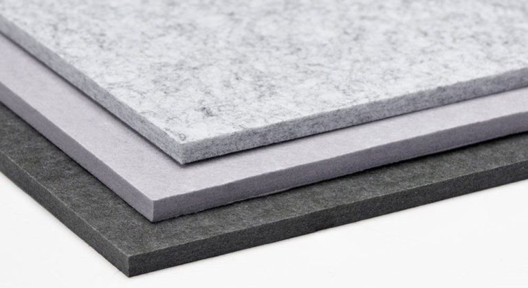 Paneles de absorción ruido de Tradelson para insonorizar paredes y techos con material reciclado.